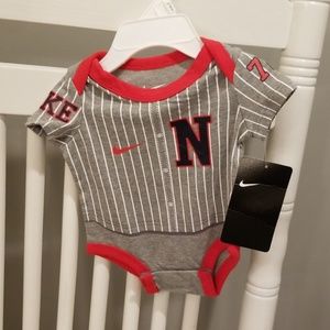 NWT. Nike Pinstripes Onesie